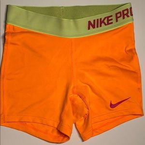 Neon orange Nike pros